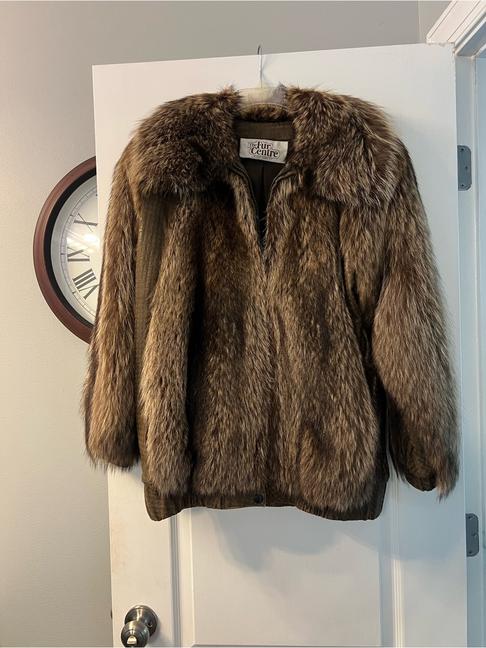 Vintage Raccoon and  leather jacket by The Fur Centre in very nice condition. L
